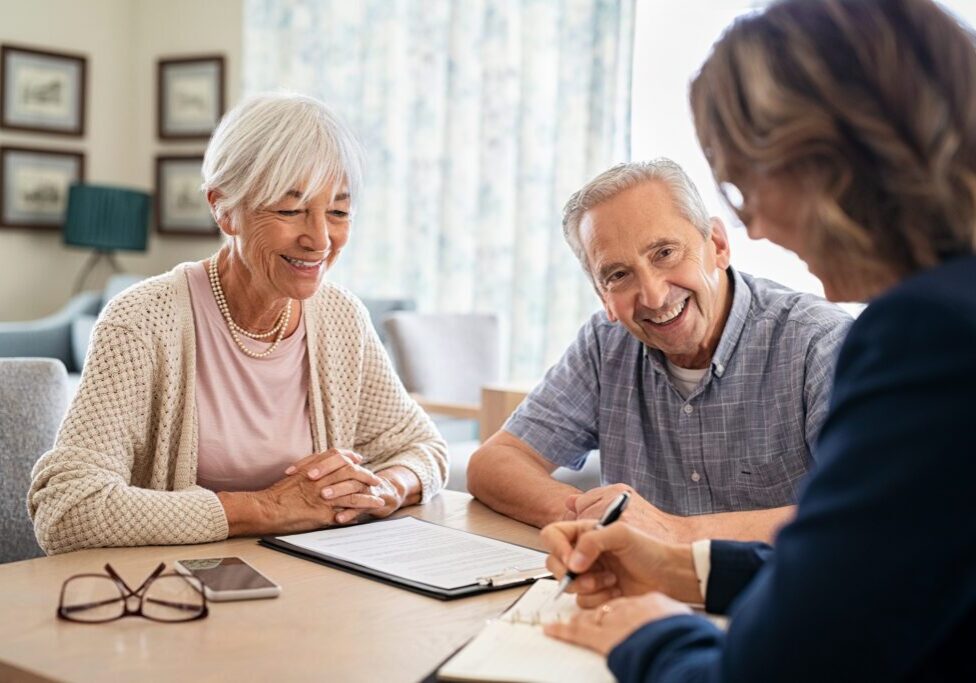 Senior couple meeting with financial advisor.